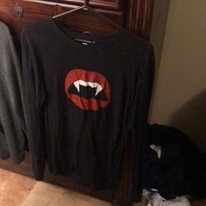 A vampire black long sleeve shirt never worn size medium